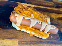 a hot dog on a bun